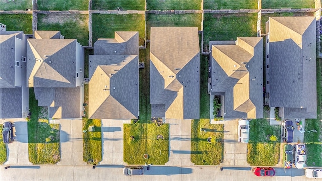 birds eye view of property with a residential view