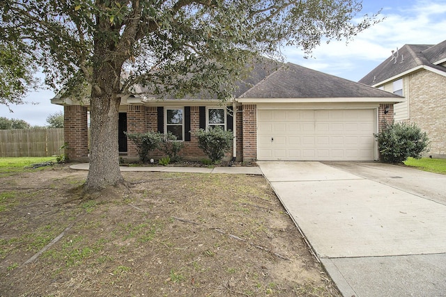 single story home featuring a garage