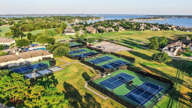 bird's eye view with a water view