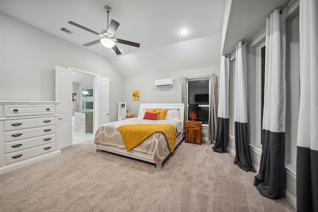 carpeted bedroom featuring an AC wall unit, ceiling fan, ensuite bathroom, and vaulted ceiling