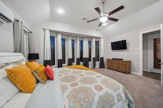 bedroom with ceiling fan, light colored carpet, a wall unit AC, and vaulted ceiling