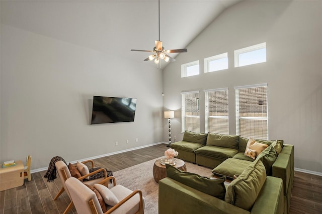 living room with ceiling fan, high vaulted ceiling, and dark hardwood / wood-style floors