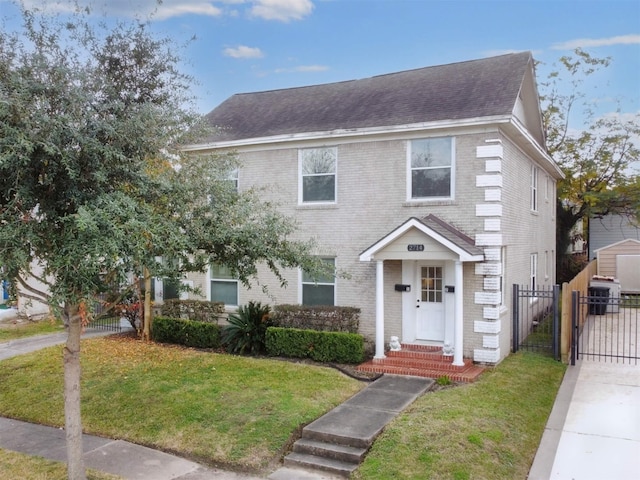 view of front of home with a front yard