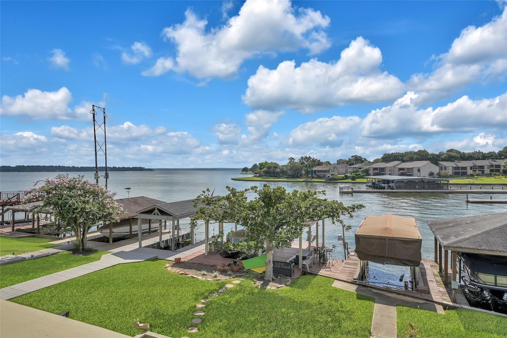 property view of water with a dock