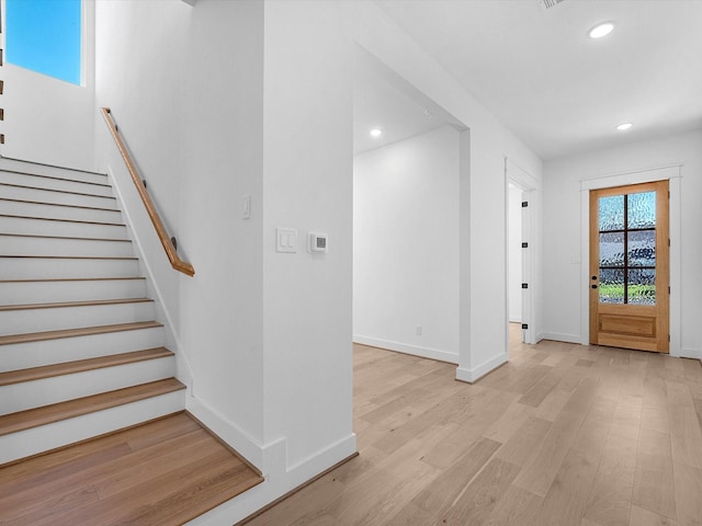 foyer entrance featuring light wood-type flooring