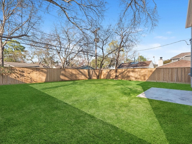 view of yard with a patio area