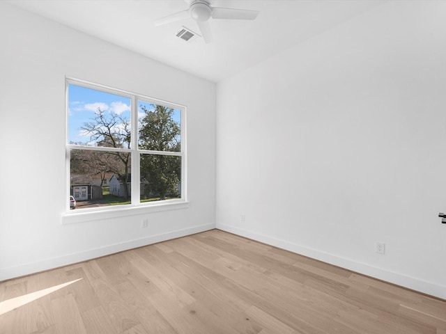 unfurnished room featuring ceiling fan and light hardwood / wood-style floors