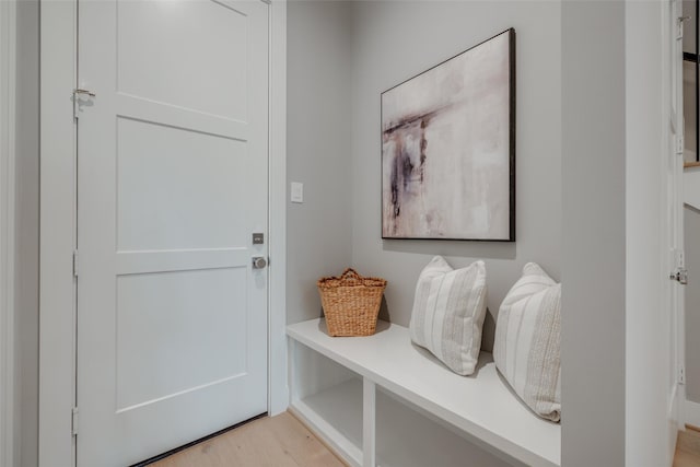 mudroom with light hardwood / wood-style floors