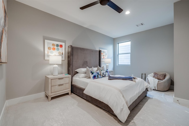 carpeted bedroom with ceiling fan