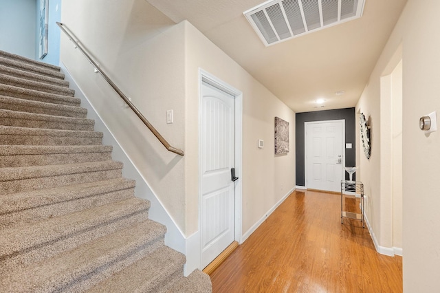 interior space with hardwood / wood-style floors