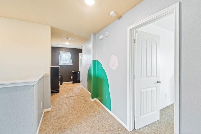 hallway featuring carpet floors