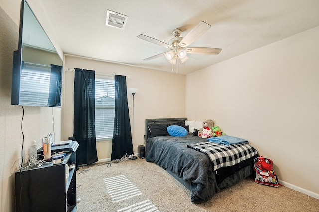 carpeted bedroom featuring ceiling fan