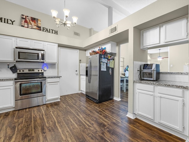 kitchen with white cabinetry, dark wood-type flooring, and appliances with stainless steel finishes