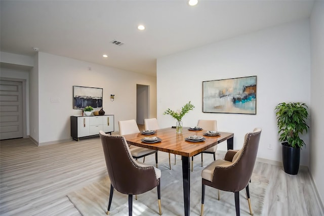 dining area featuring light hardwood / wood-style floors