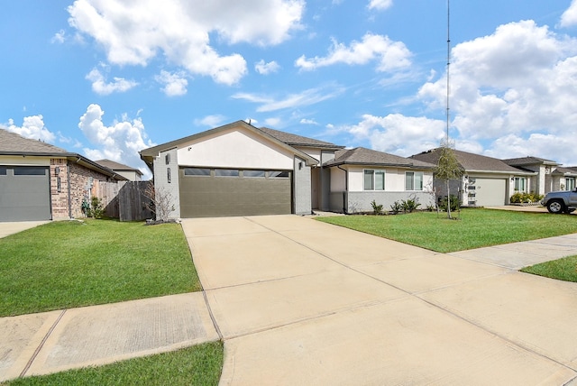 ranch-style home with a garage and a front yard