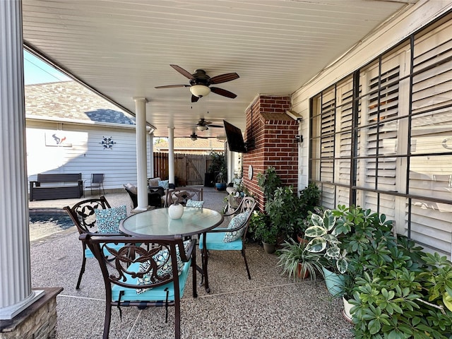 view of patio featuring ceiling fan