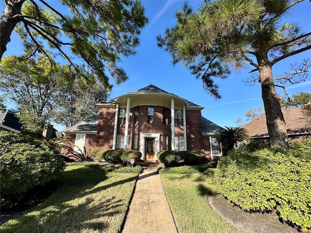 view of front of house with a front yard