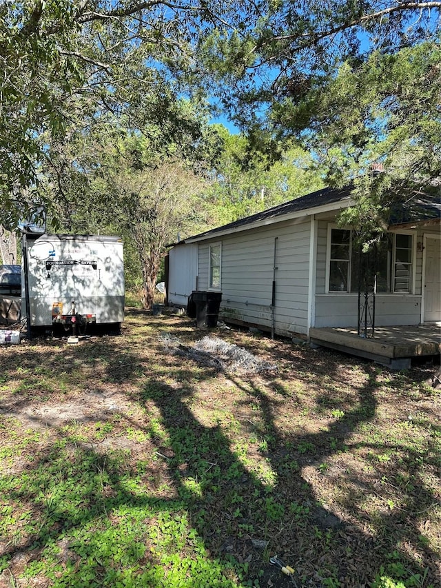 view of yard with a deck