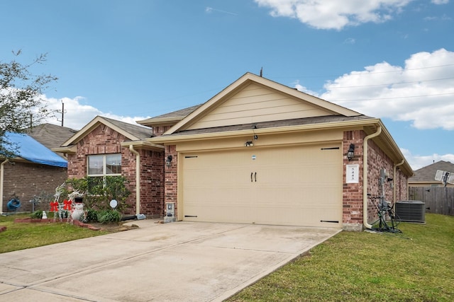 single story home featuring a front yard, a garage, and central air condition unit