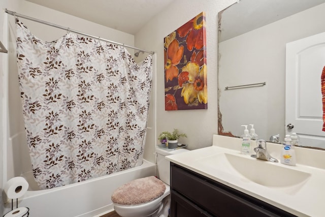 full bathroom featuring vanity, toilet, and shower / bath combo with shower curtain