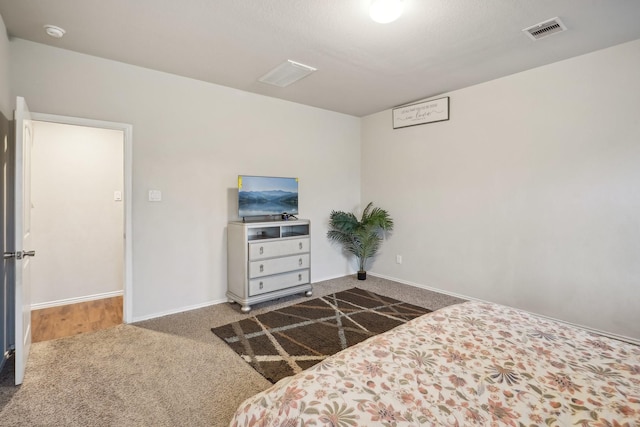 bedroom featuring carpet