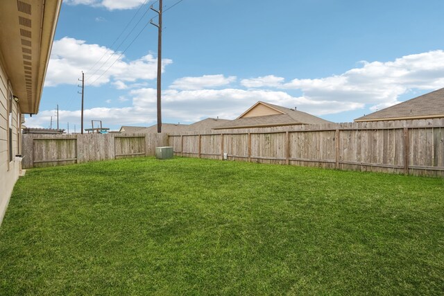 view of yard featuring central AC