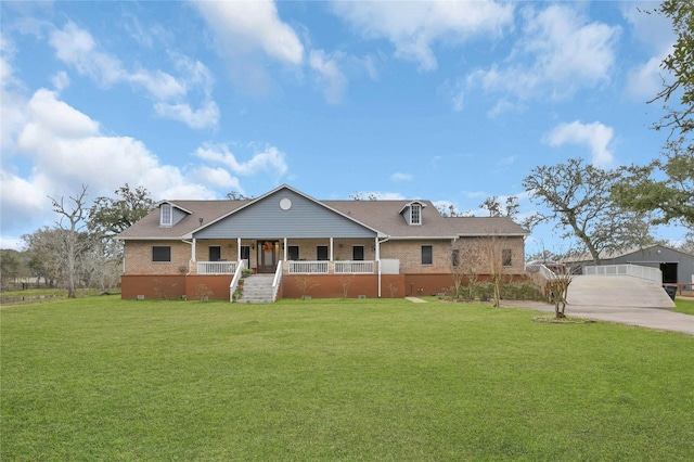 ranch-style home with a front yard and a porch