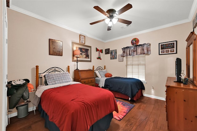 bedroom with ceiling fan, dark wood-type flooring, and ornamental molding