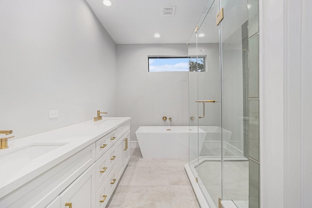 bathroom featuring independent shower and bath and vanity