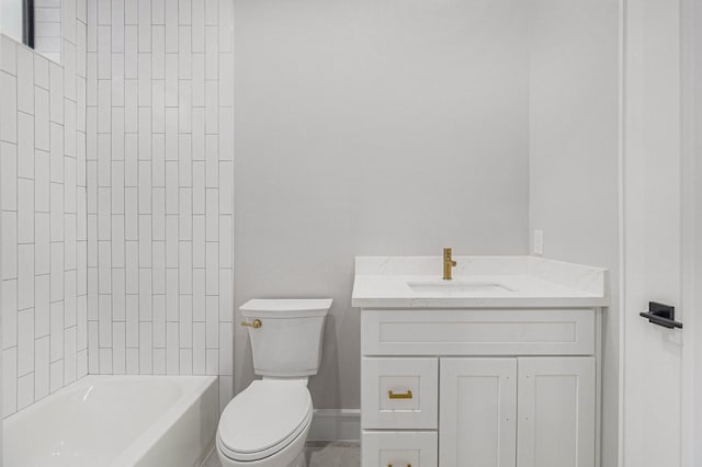 full bathroom featuring toilet, tiled shower / bath, and vanity