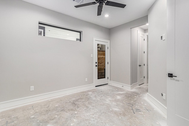 interior space with ceiling fan