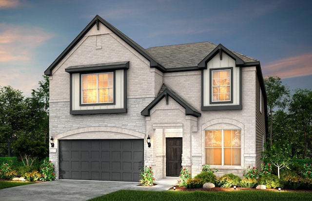 view of front of home with a garage