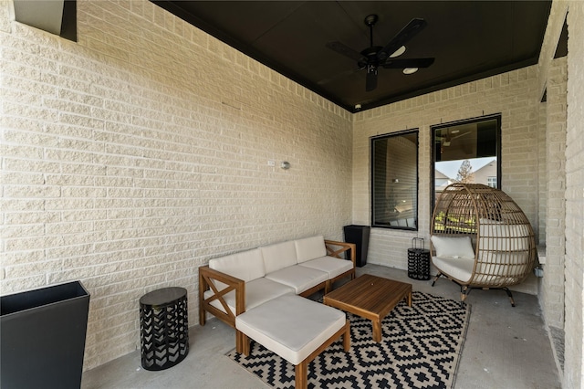 view of patio with ceiling fan and an outdoor hangout area