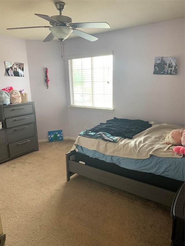 bedroom with carpet flooring and ceiling fan