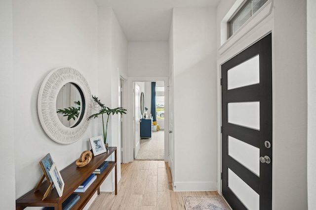 entrance foyer featuring light hardwood / wood-style floors