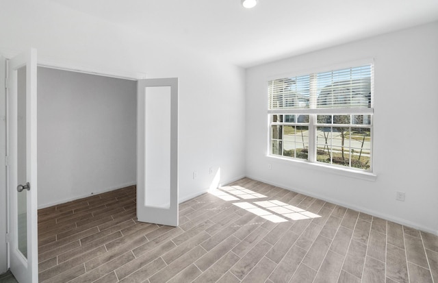 unfurnished bedroom with light wood-style floors