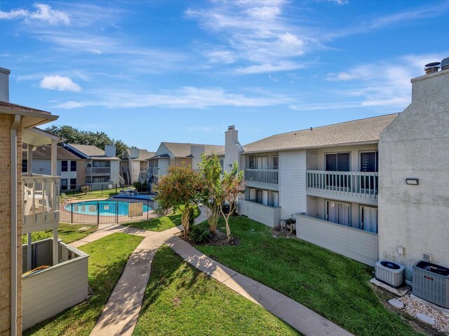 view of community featuring a swimming pool