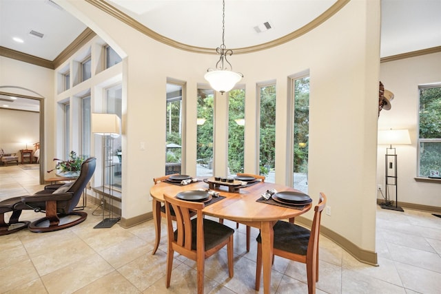 tiled dining space with crown molding