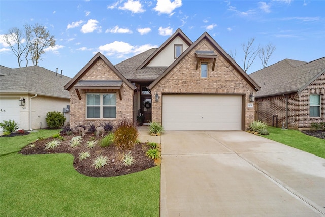 view of front of property featuring a front yard and a garage