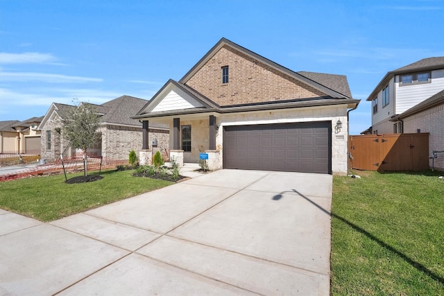 view of front facade with a garage and a front yard