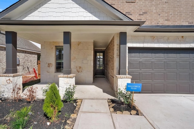 doorway to property with a porch