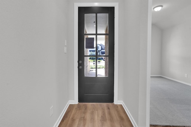 doorway to outside featuring light hardwood / wood-style flooring