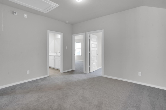 empty room with light colored carpet