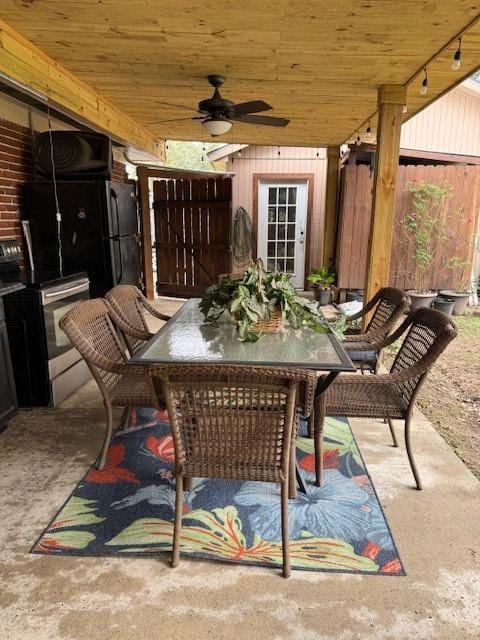 view of patio / terrace featuring ceiling fan