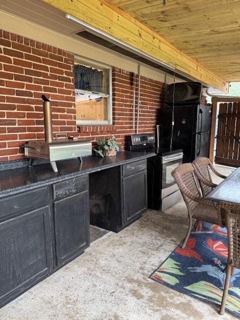 view of patio with exterior kitchen