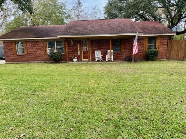 ranch-style home with a front yard