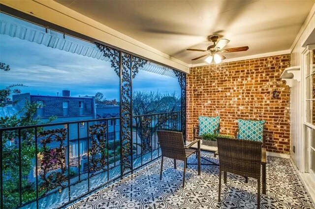 balcony at dusk with ceiling fan