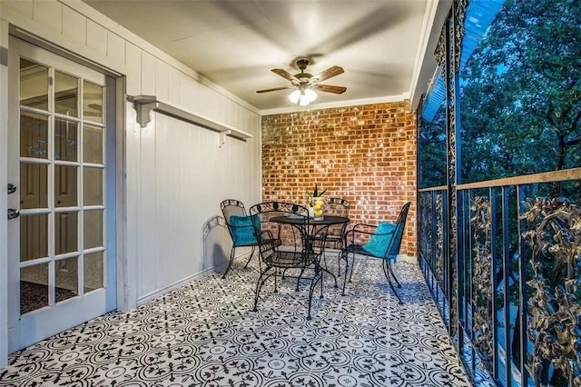 balcony featuring ceiling fan