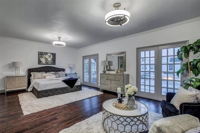 bedroom with french doors, access to outside, ornamental molding, and dark wood-type flooring