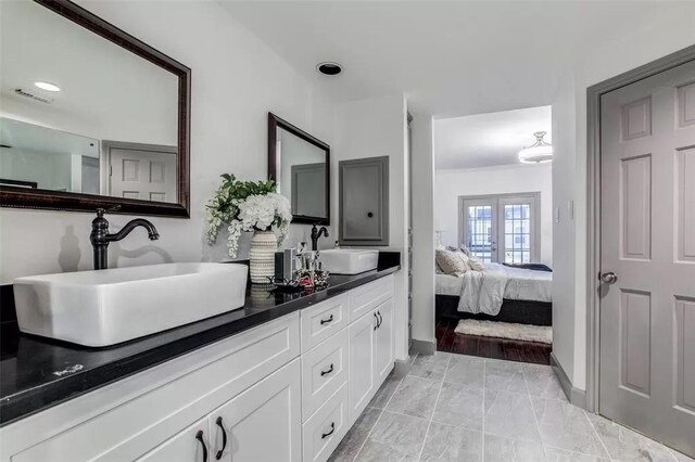 bathroom featuring vanity and french doors